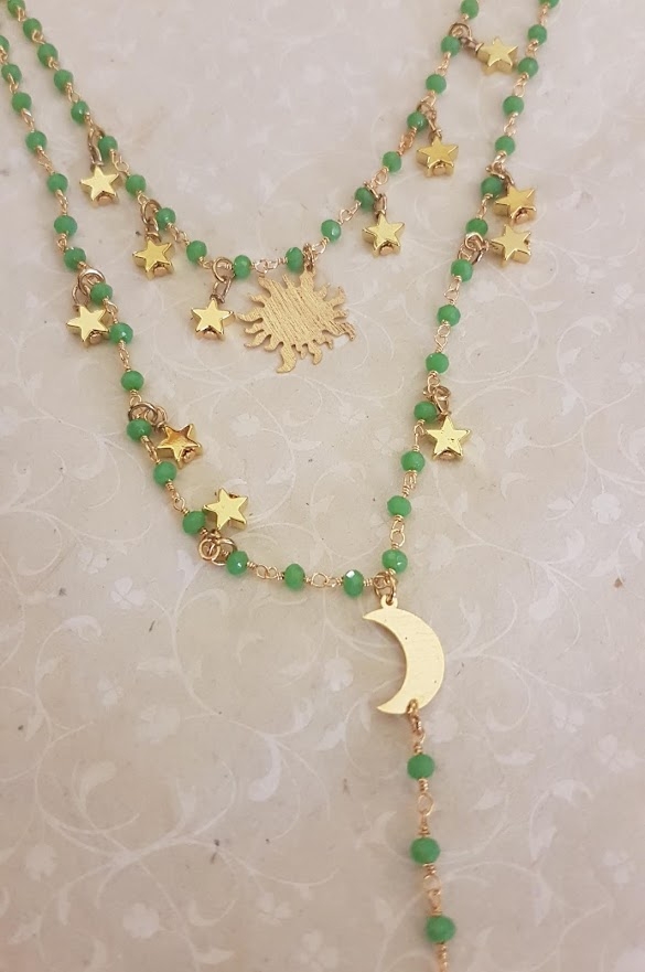 Collana doppia dorata con sole luna e stelle
