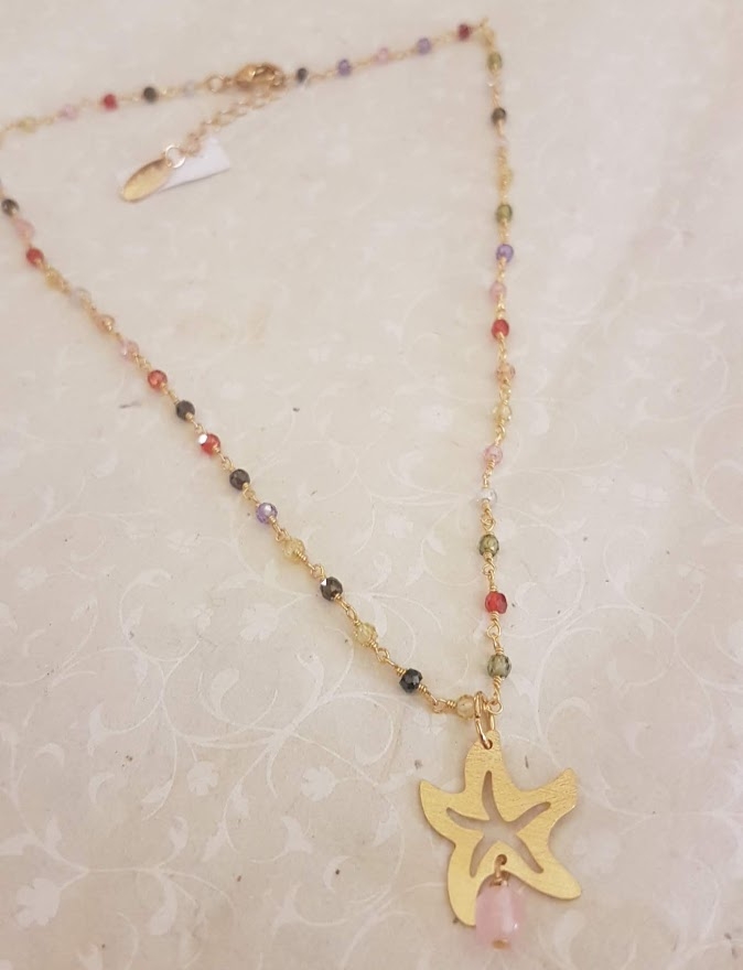 Collana girocollo dorata con stella marina