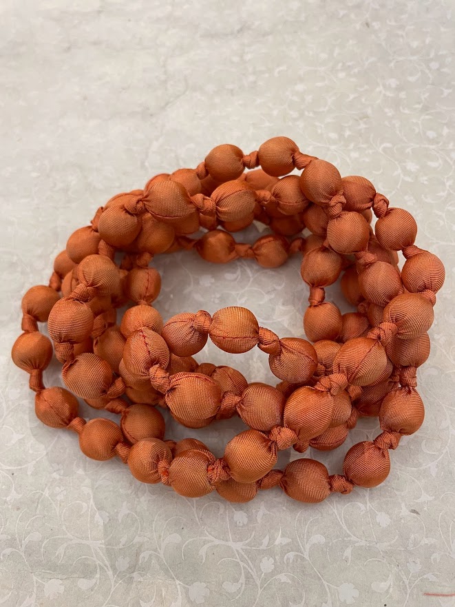Collana in seta Doan nodi Arancio Zucca