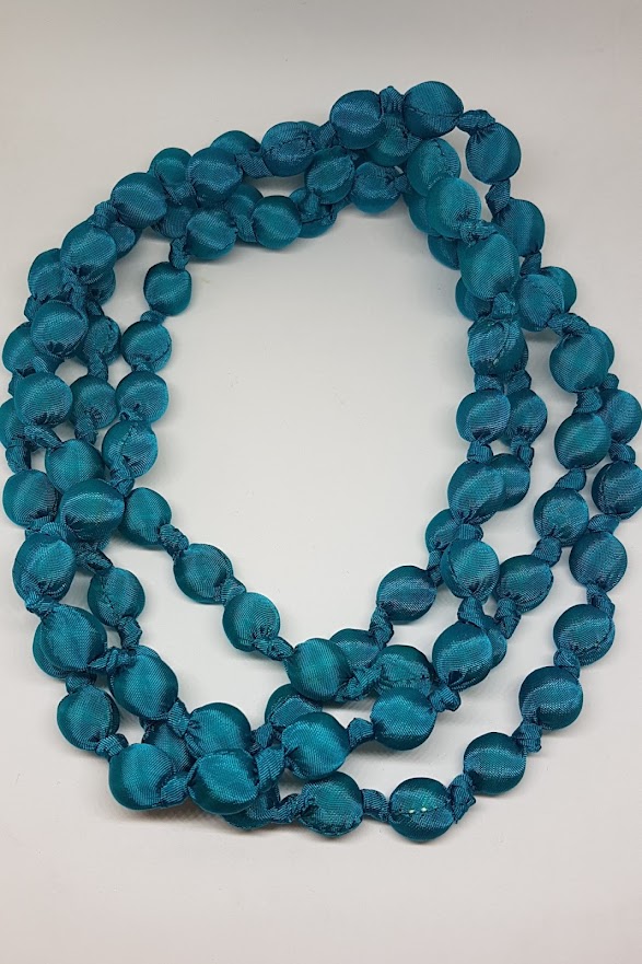 Collana in seta nodi Doan Turchese