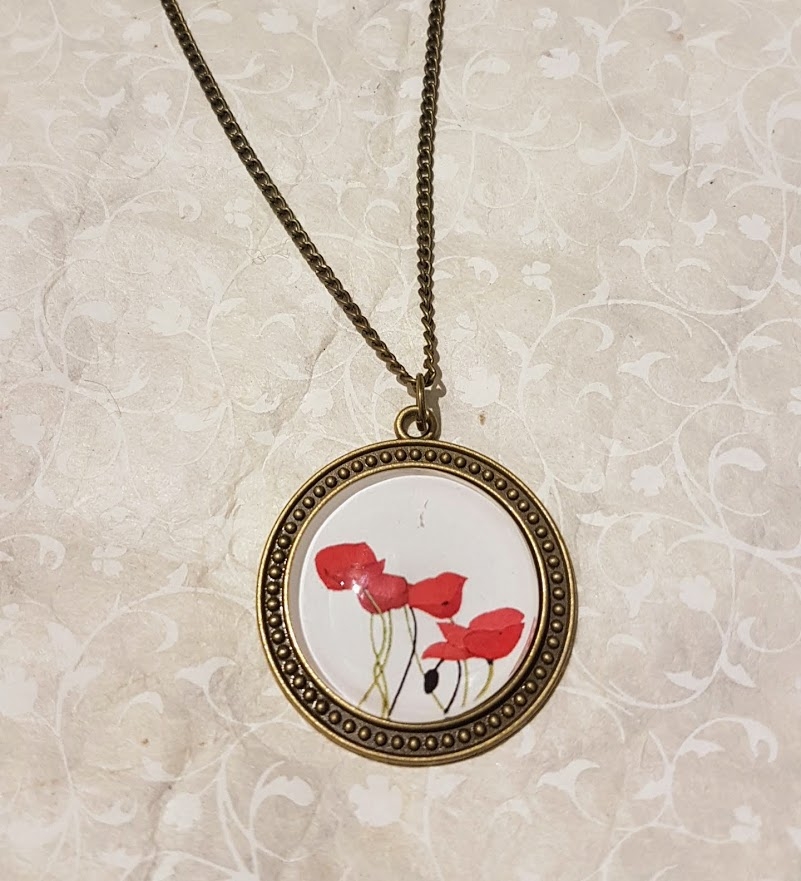 Collana lunga con medaglione metallo anticato in musica Papaveri Rossi - Soul Scope
