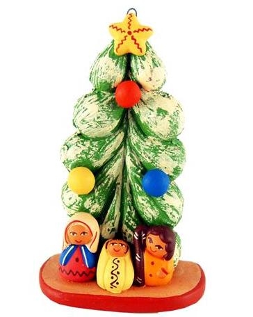 Presepe con albero di Natale innevato