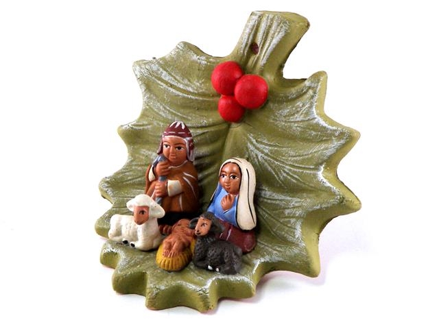 Presepe terracotta su foglia di vischio